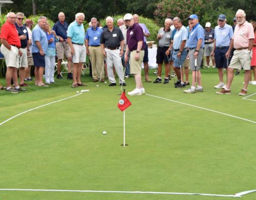 Rob Harris sinks 1st putt of the event